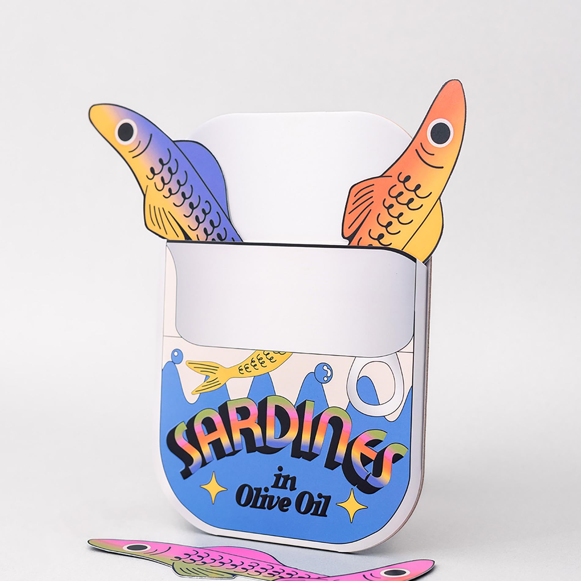 Colorful sardines in a can bookmark on a white background out of packaging