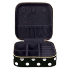 Black jewelry case with gold polka dot accents on a white background