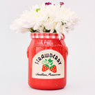 strawberry jam petite ceramic vase with a bouquet in the top