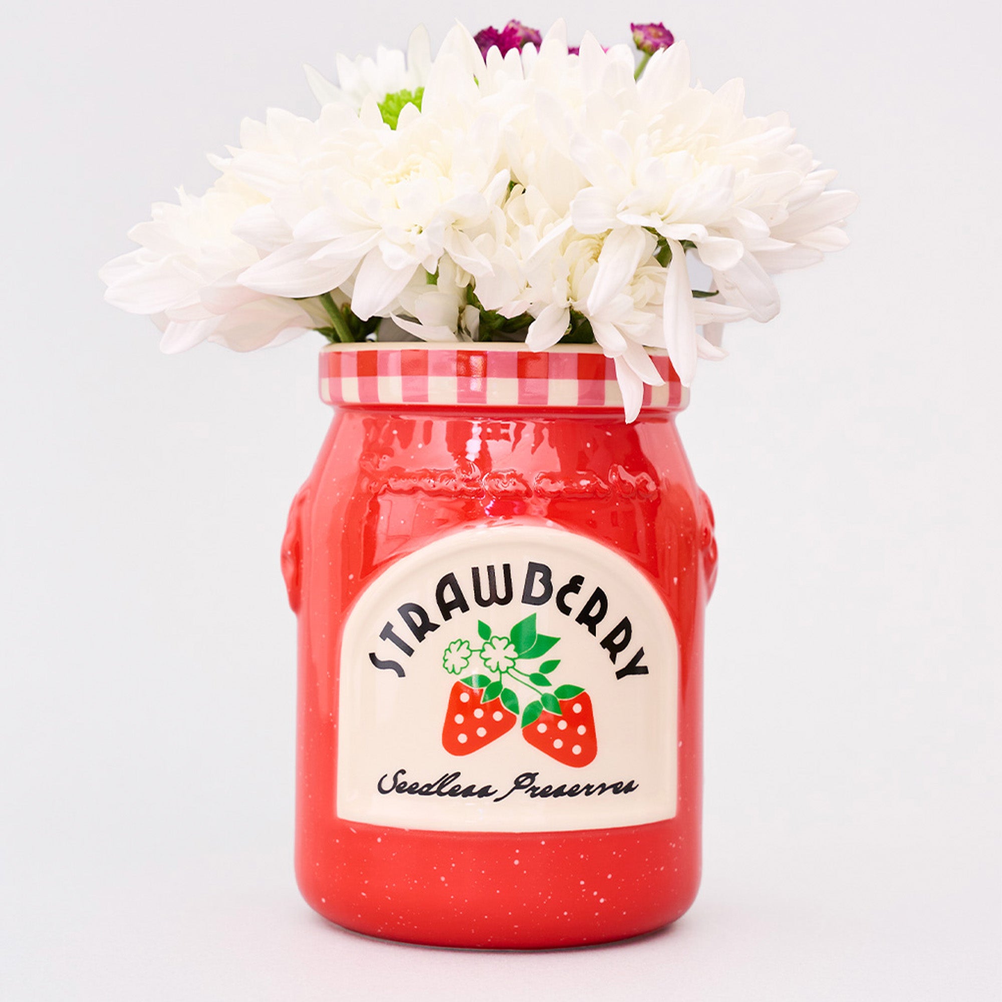 strawberry jam petite ceramic vase with a bouquet in the top