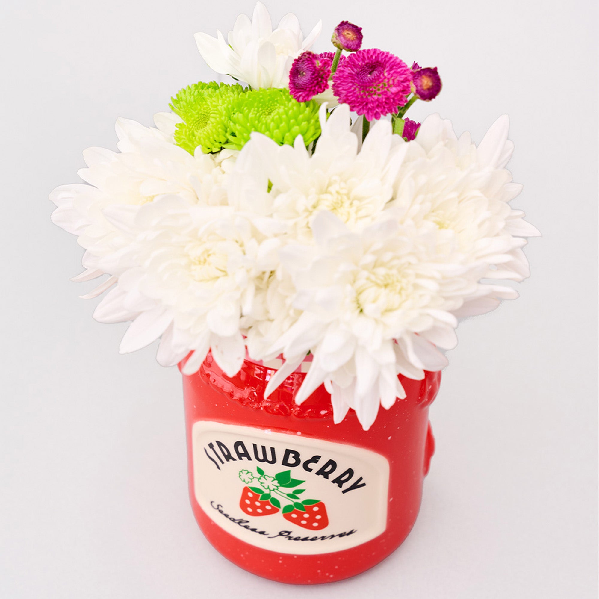 strawberry jam petite ceramic vase with a bouquet in the top
