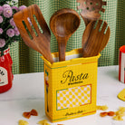yellow pasta box vase  with wooden utensils inside
