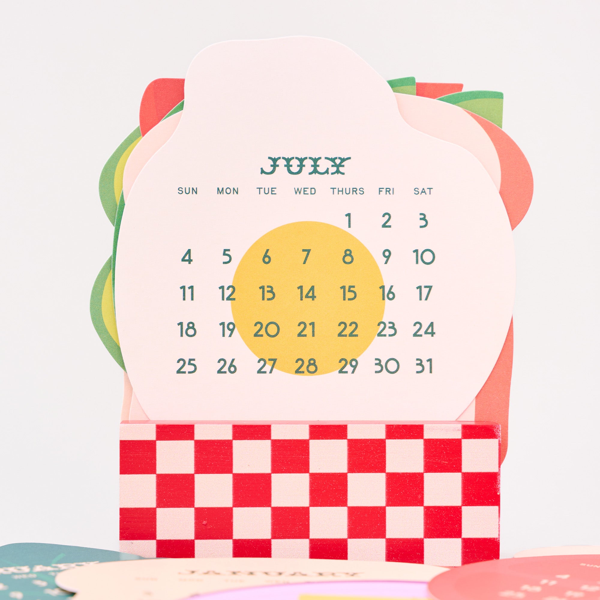Calendar for July with a colorful design on a white background