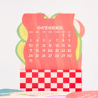 Calendar with a colorful design, featuring the month of October.