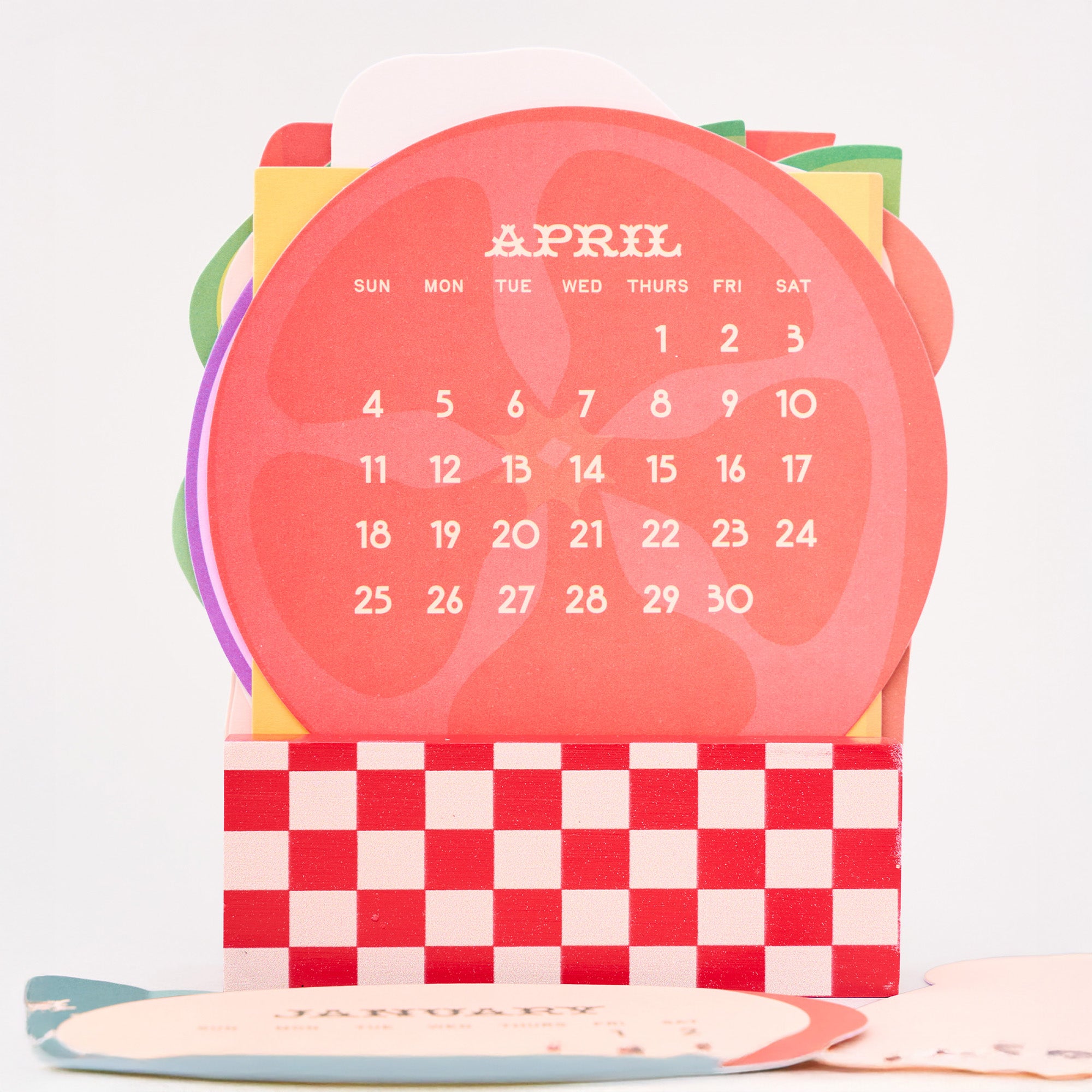 April calendar with colorful border on a white background