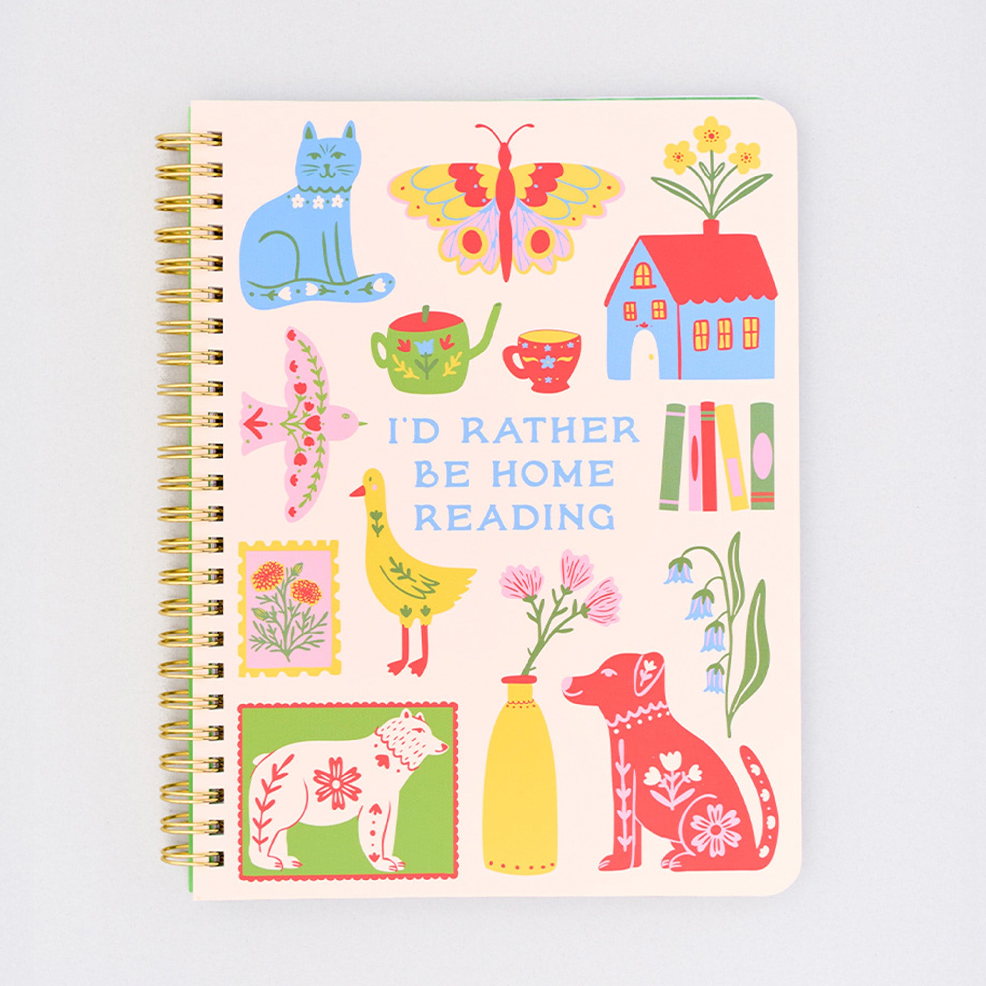 cream mini notebook with colorful folk graphics and 'i'd rather be home reading' across the center