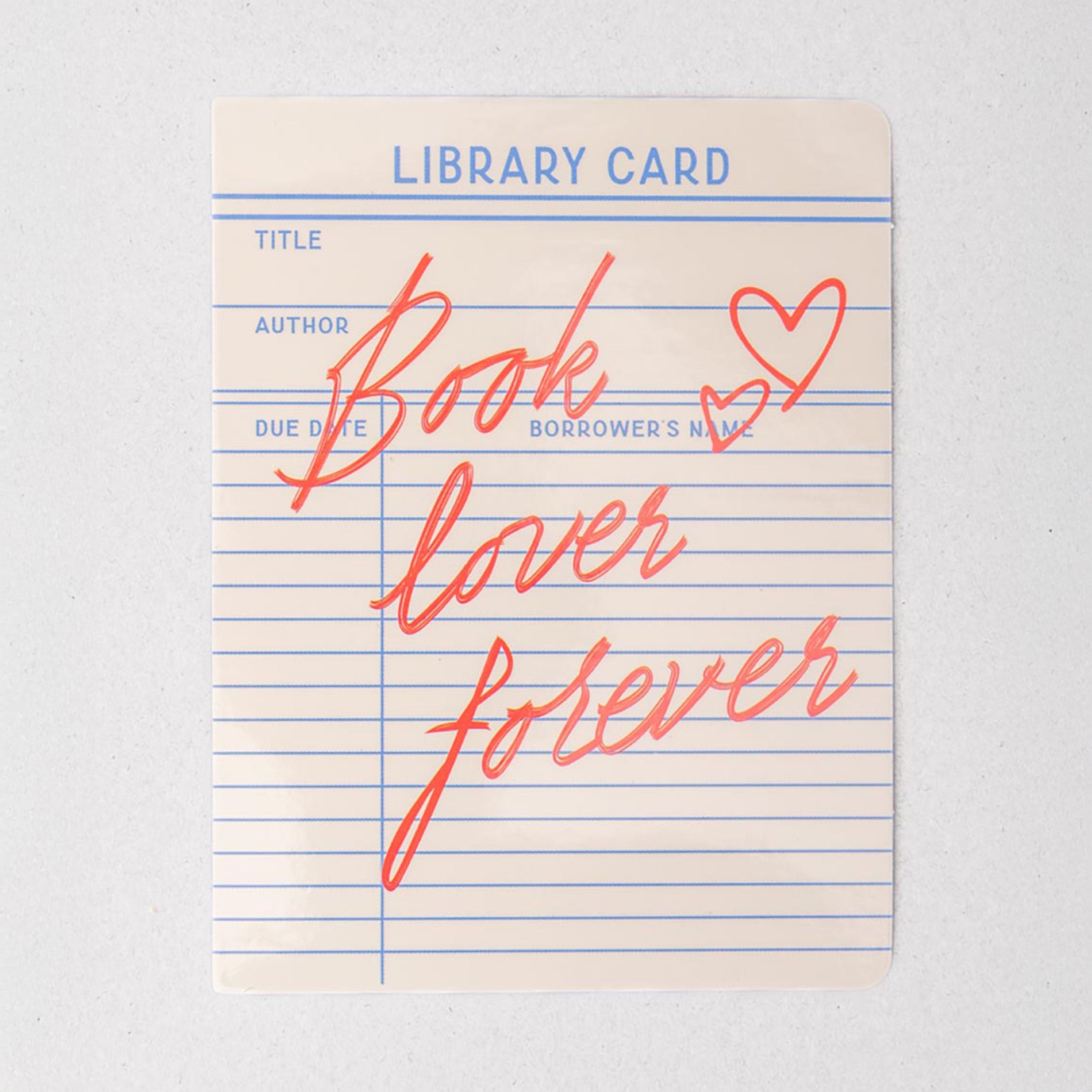 Library card with 'Book lover forever' text on a light gray background