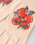 Beige gardening gloves with tomato design on a light gray background