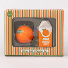 Citrus salt and pepper set in packaging with orange design on a white background