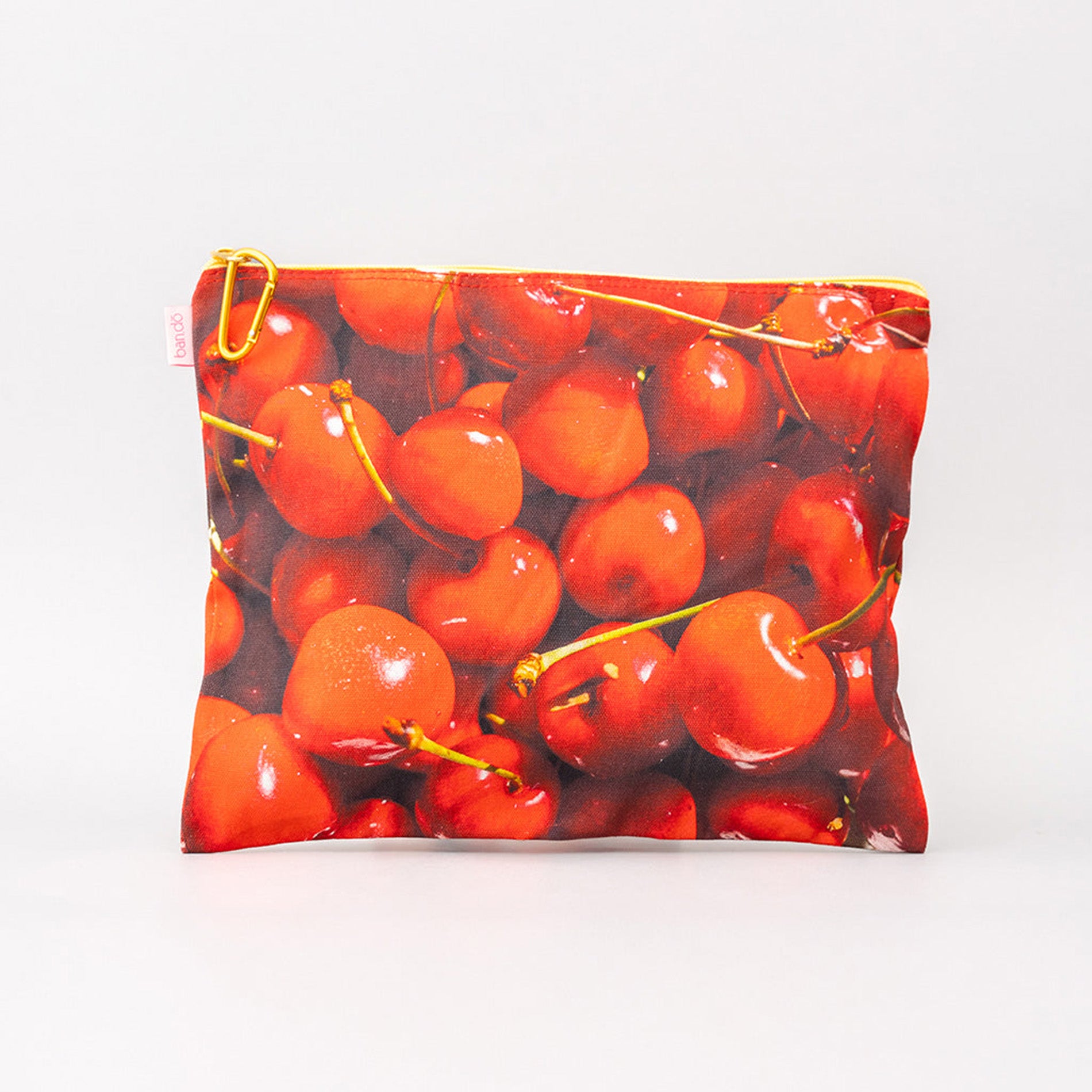 Pouch with cherry design on a white background