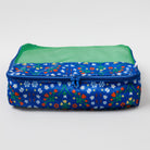 A rectangular zippered travel organizer bag with a blue floral print exterior and a green mesh interior, shown on a light gray background.