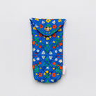 A quilted fabric sunglasses case with a blue background and a colorful floral print, shown on a light gray background with sunglasses inside.