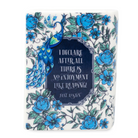 Book-shaped candle with 'Pride and Prejudice' design on a white background