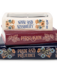 Stack of books titled 'Sense and Sensibility', 'Persuasion', and 'Pride and Prejudice' with decorative covers on a white background.
