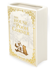Book-shaped container with 'The House at Pooh Corner' design on a white background