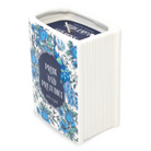 Book-shaped candle with 'Pride and Prejudice' design on a white background