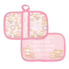 Set of two pink pot holders with tea-themed designs on a white background