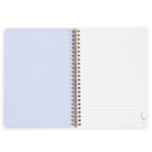 Open spiral-bound notebook with lined pages on a white background