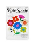 Kate Spade magazine cover vase with colorful flowers on a white background