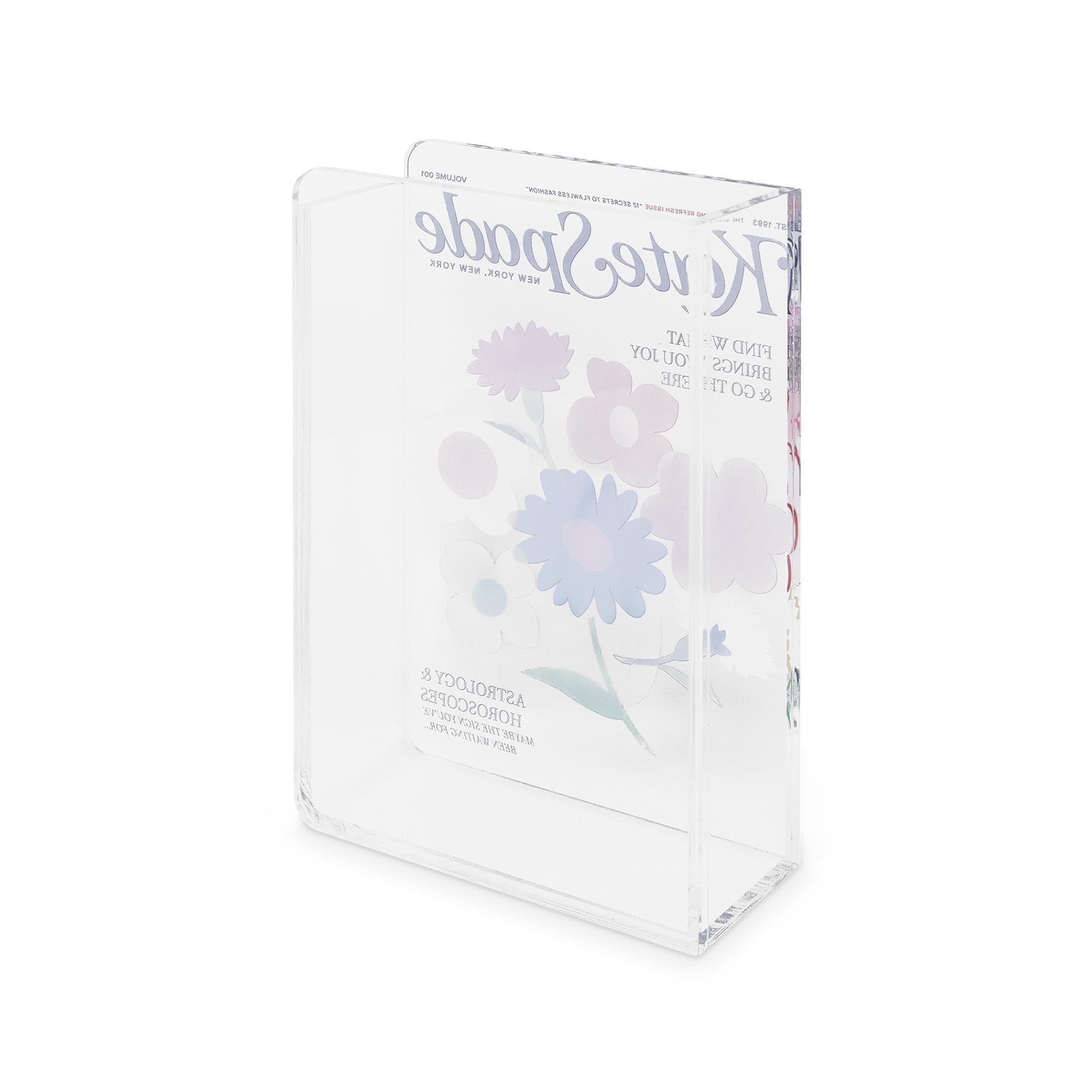 Back view of Kate Spade book vase with colorful flowers on a white background