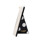 side view of black and white polka dot acrylic desk calendar