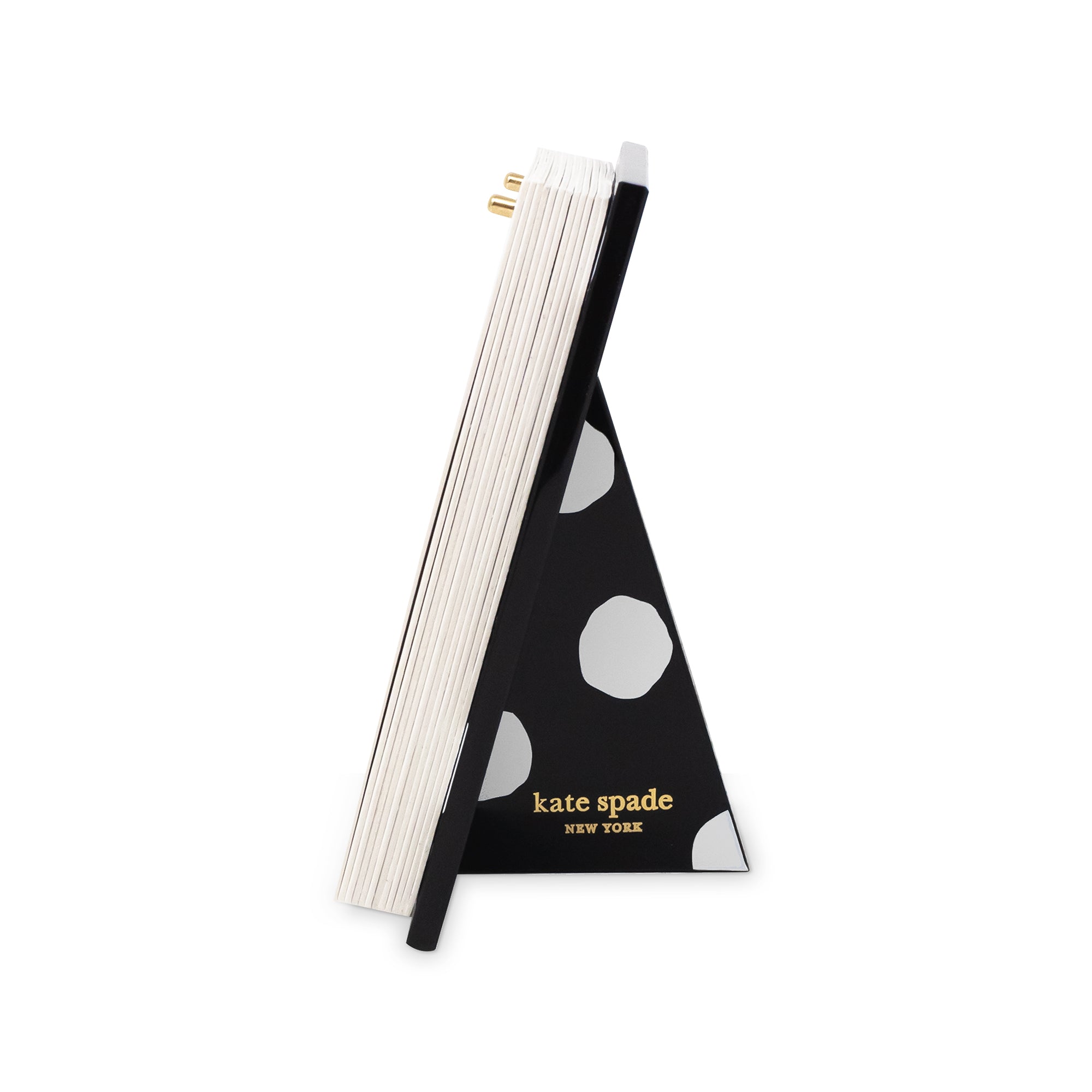 side view of black and white polka dot acrylic desk calendar