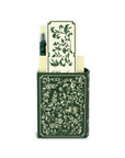 Stationery set with green floral design including a pen, paper, and holder on a white background.
