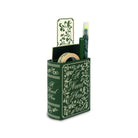 Green book-shaped desk organizer with stationery items on a white background