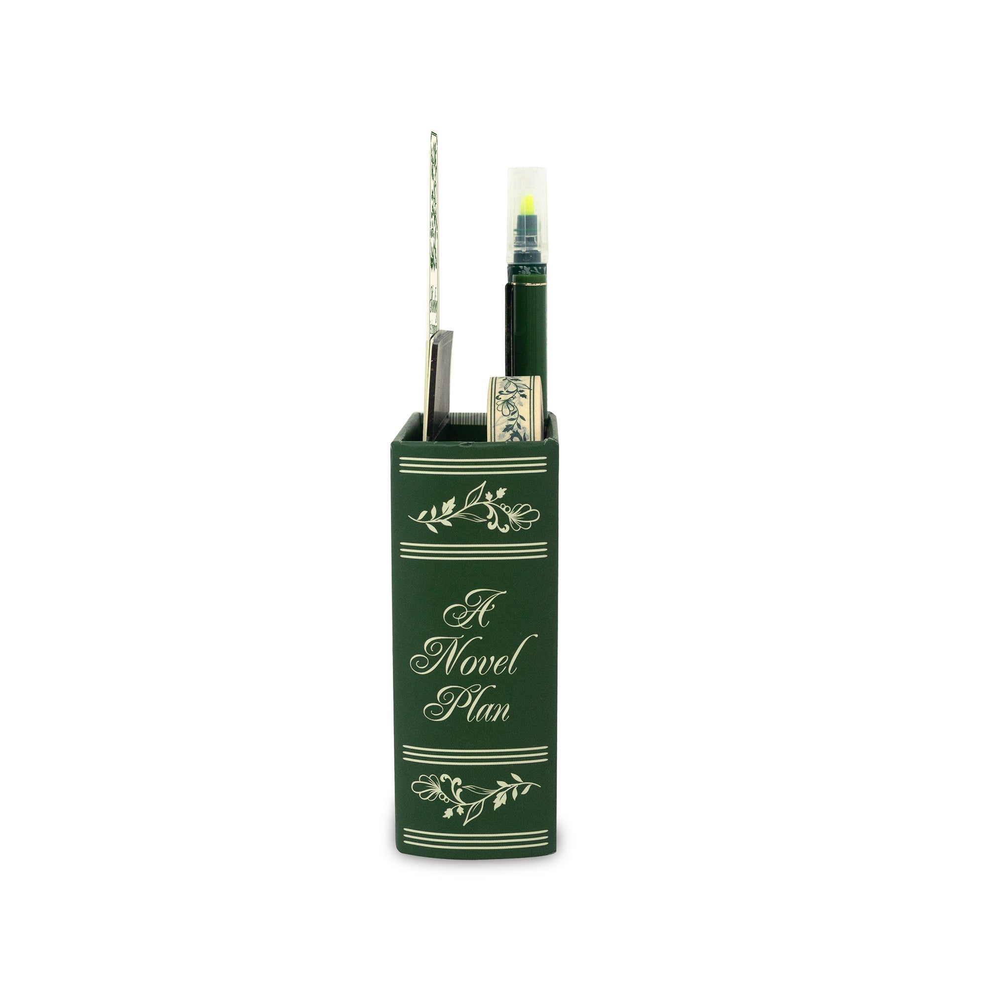Green book-shaped pen holder with a pen  on a white background