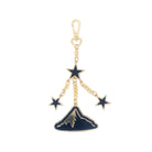 Keychain with mountain and star charms on a white background