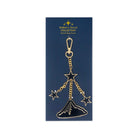 Gold star-shaped bag charm on a blue card with 'Sarah J. Maas Collection' branding.