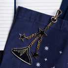 Keychain with mountain and star charms 