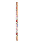 Floral-patterned pen with gold accents on a white background