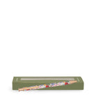 Floral-patterned pencil with green box on a white background