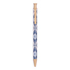Pen with blue and white pattern and rose gold accents on a white background