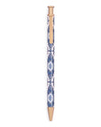 Pen with blue and white pattern and rose gold accents on a white background