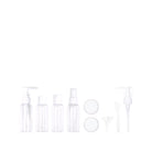 Set of transparent skincare bottles and containers on a white background