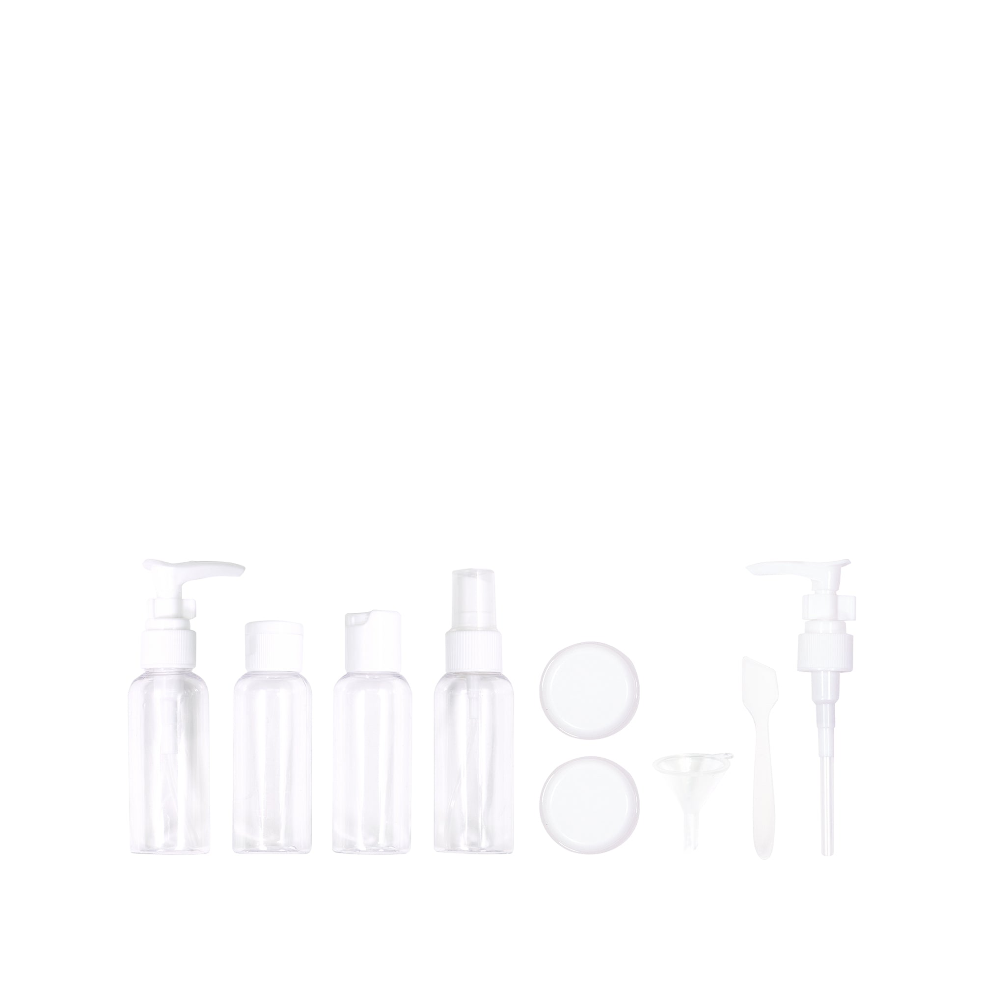 Set of transparent skincare bottles and containers on a white background