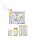 Set of pastel floral pouch, striped pouch, and cylindrical container on a white background