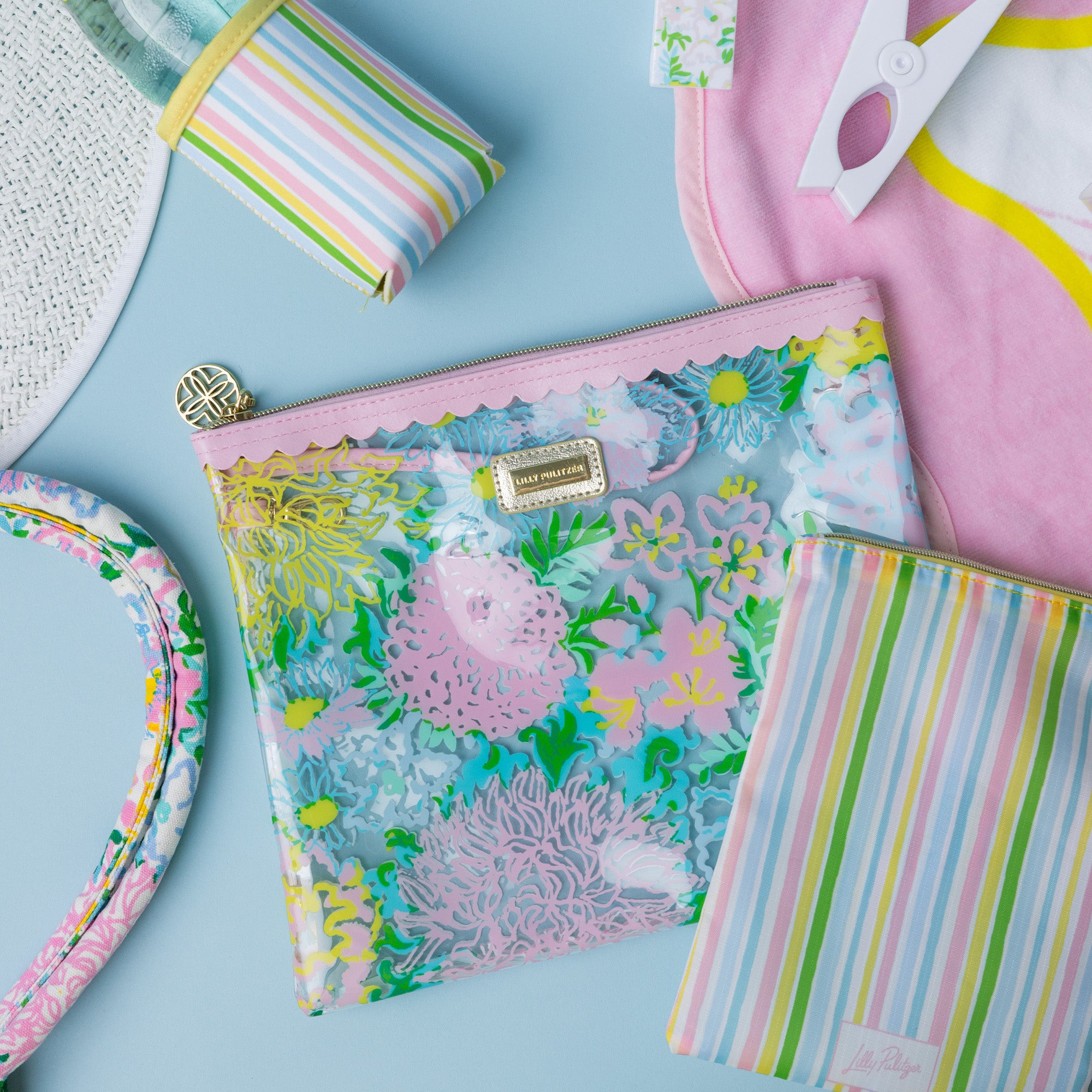 Colorful pouch with floral design on a blue background