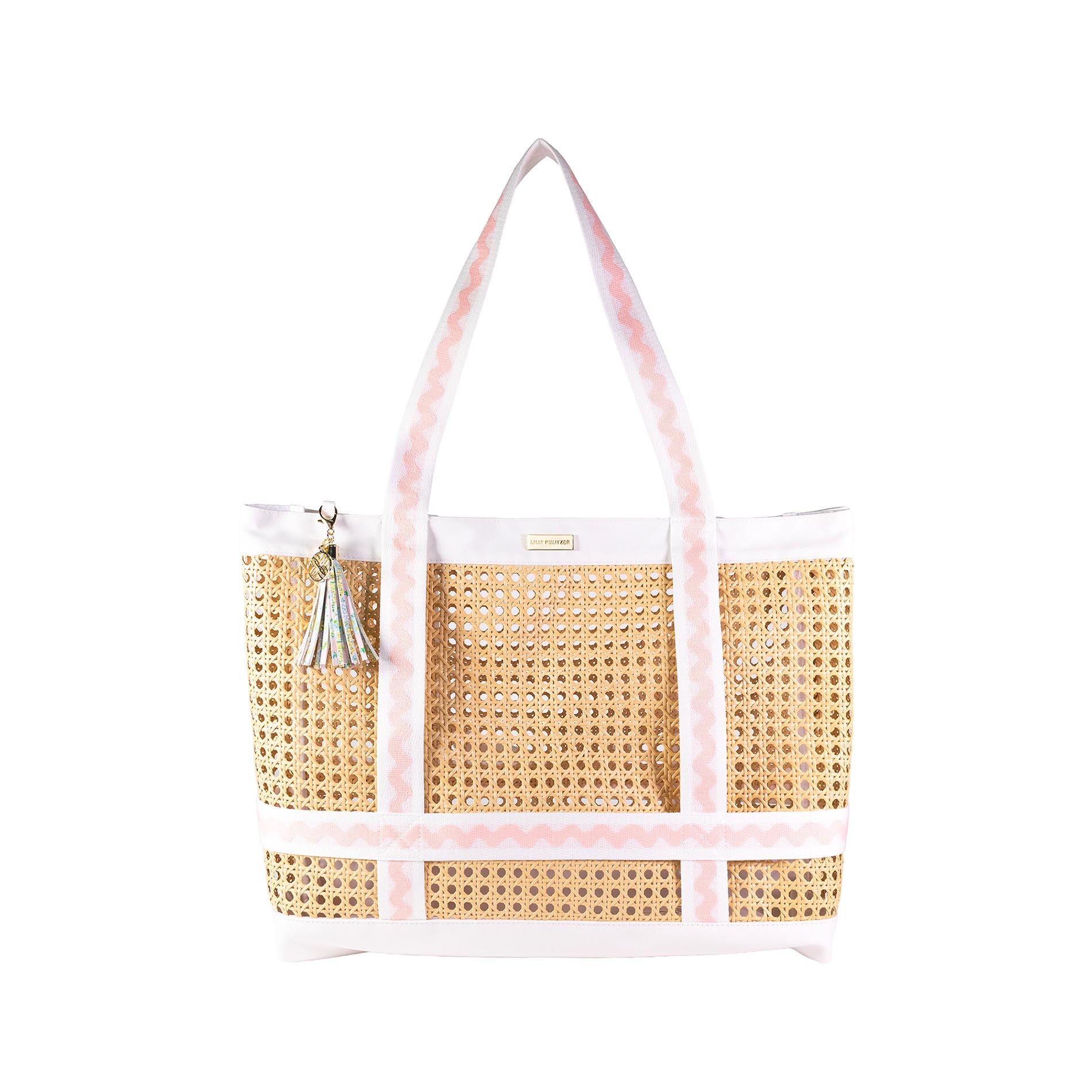 Woven tote bag with pink handle on a white background