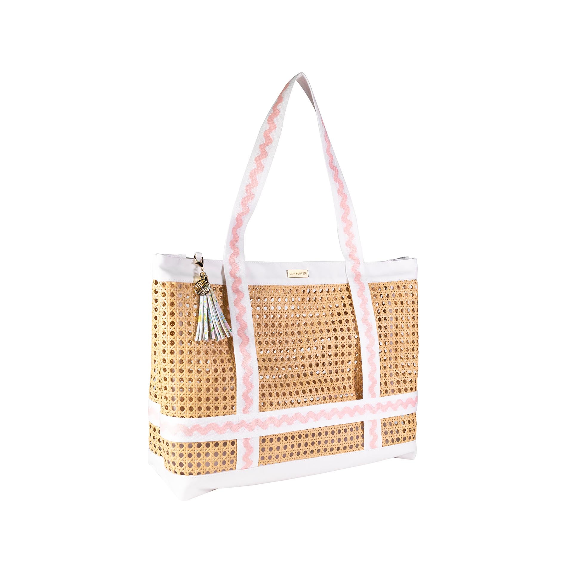 Woven tote bag with pink trim and white handle on a white background