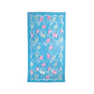 Towel with shell pattern on a blue background