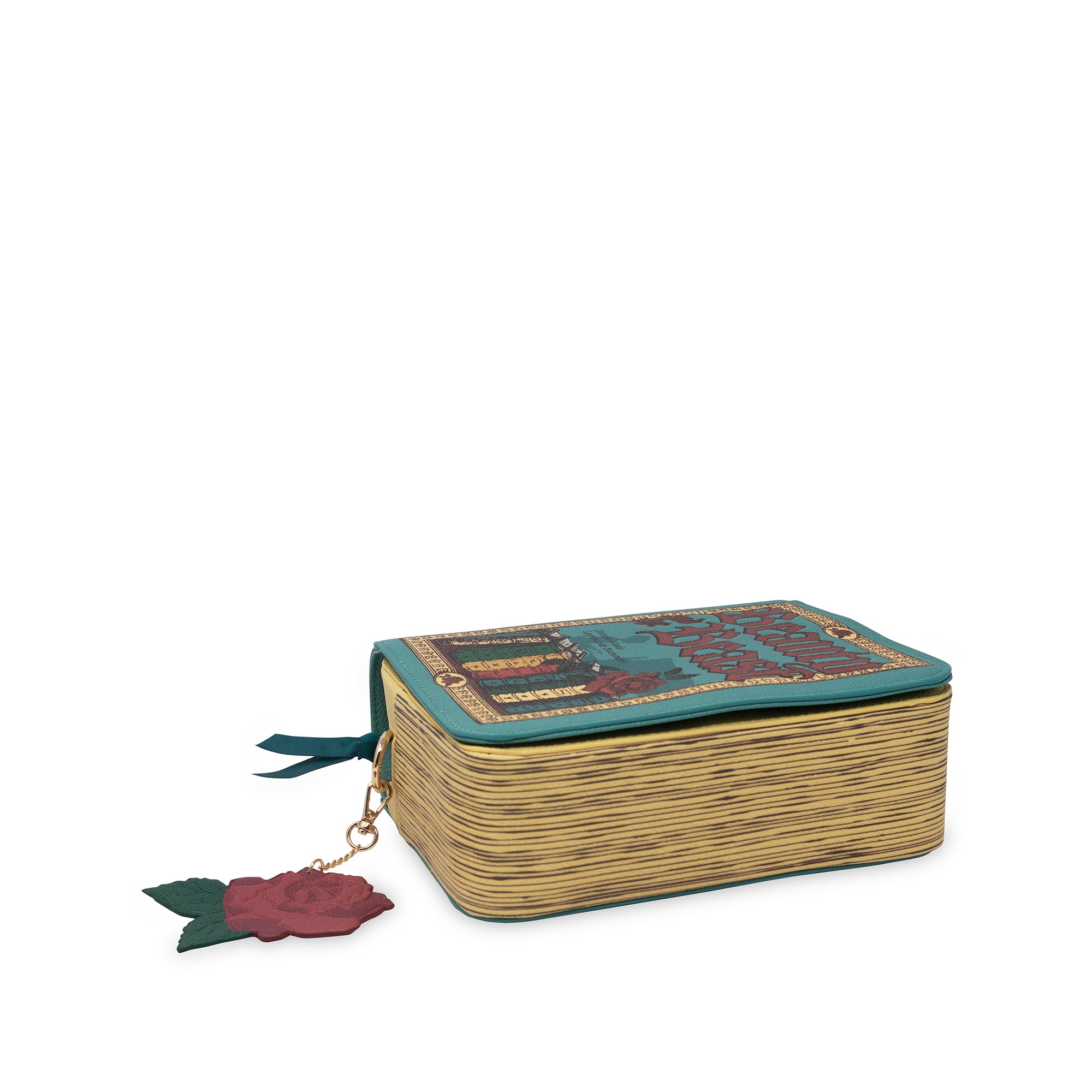 Book-shaped handbag with 'Beauty and the Beast' design on a white background