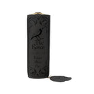 A black leather-like bag with embossed gothic-style raven artwork and the words 'The Raven' and 'Edgar Allan Poe' on the front, shown upright on a white background with a small matching tag attached.