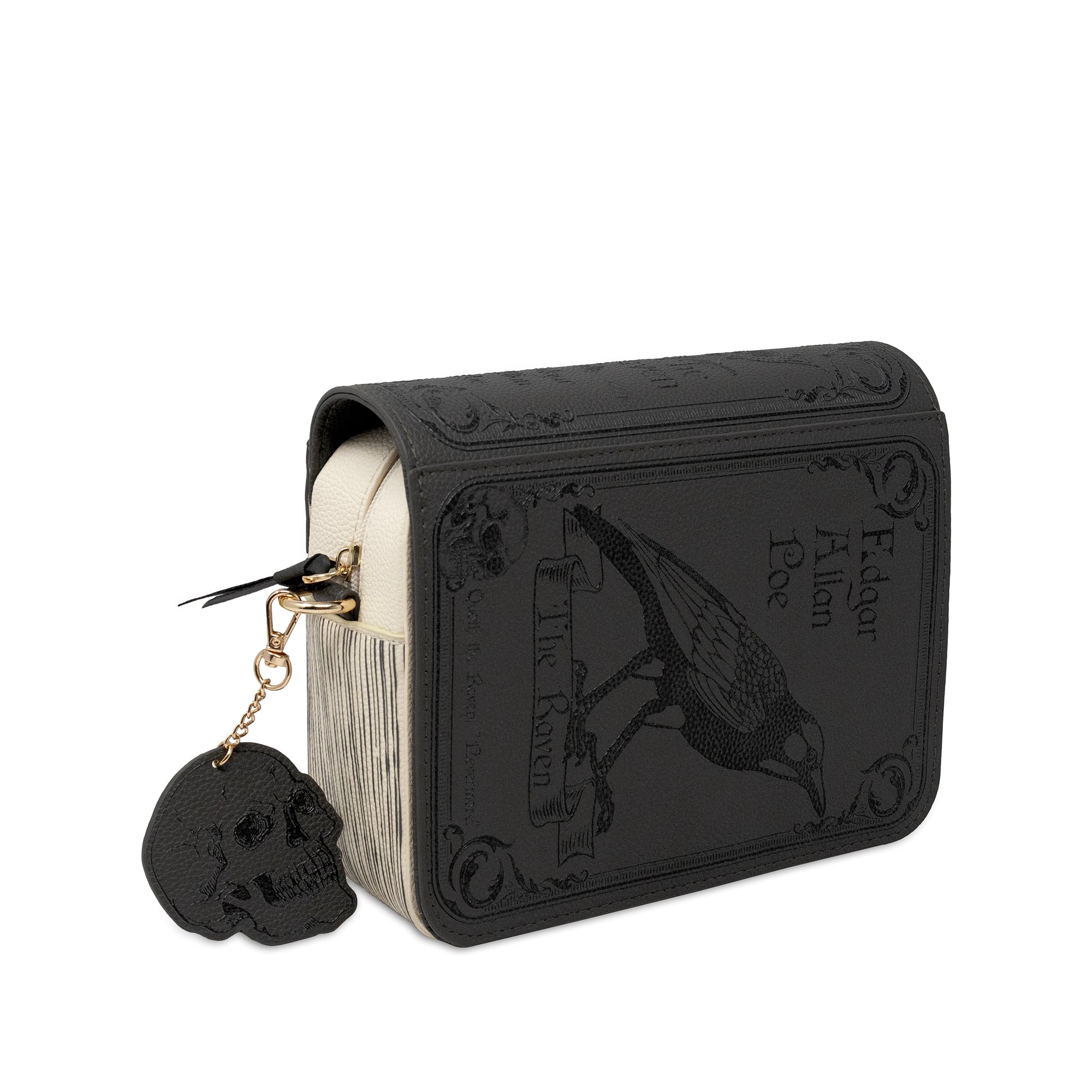 A black faux-leather book-style crossbody featuring embossed gothic artwork of a raven and the text 'Hester Allan Poe' from 'The Raven', with a cream-colored page edge visible on the left and a dangling black skull charm on a gold chain.