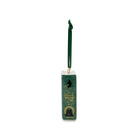 A small decorative ornament shaped like the book 'The Wonderful Wizard of Oz' with a green ribbon loop at the top, shown on a plain white background.