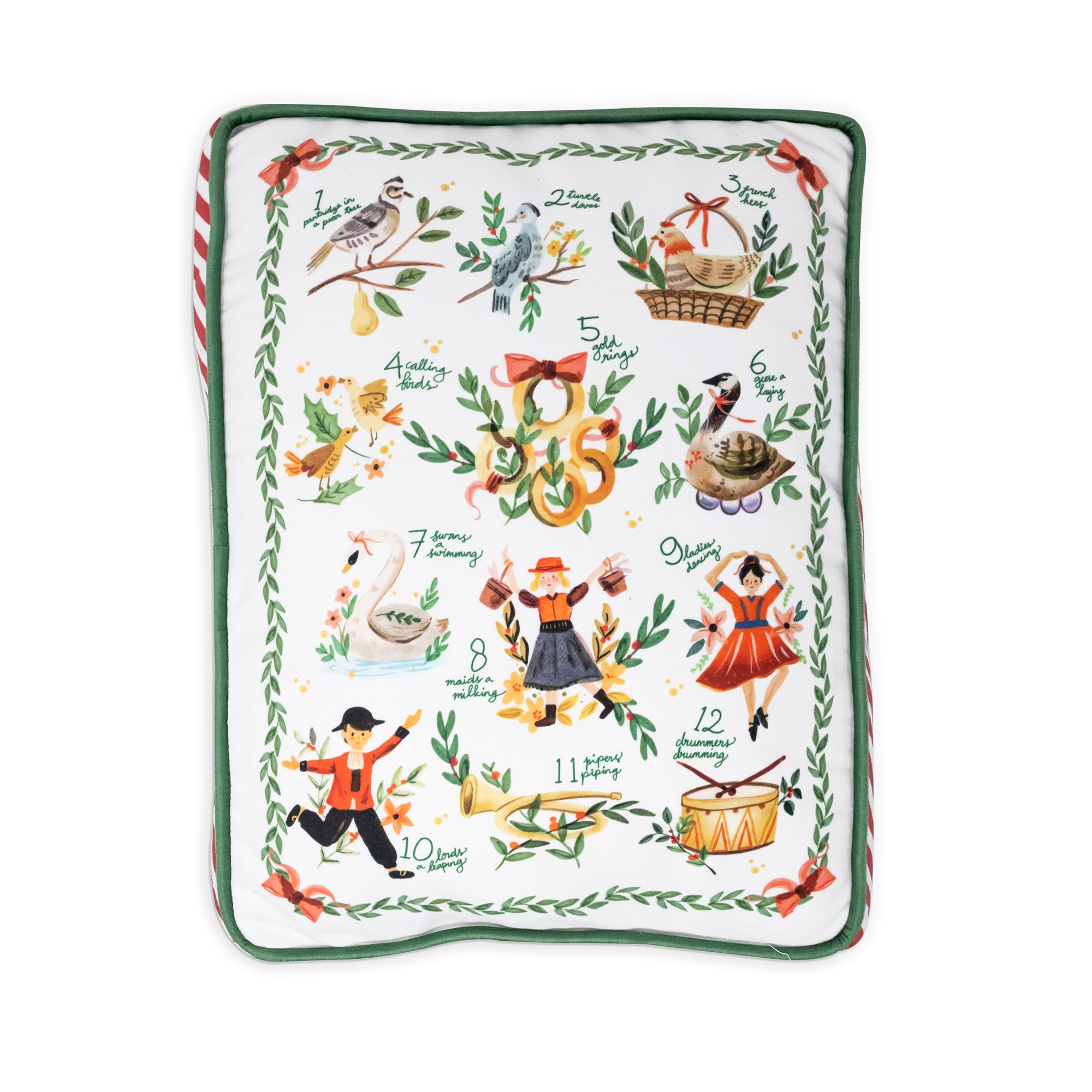 A square decorative cushion cover featuring a white background with a colorful Christmas-themed illustration, surrounded by a green leaf border and red-and-white striped piping.