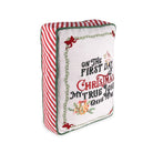A square decorative throw pillow with a festive Christmas design. The front features a white background with embroidered-style text reading 'ON THE FIRST DAY OF CHRISTMAS MY TRUE LOVE GAVE TO ME' in green and red lettering, surrounded by a green vine border with red bows and small floral details.