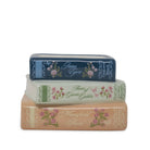 Three decorative book-shaped items stacked vertically on a white background, featuring floral designs and titles including Jane Eyre, Anne of Green Gables, and Mansfield Park.